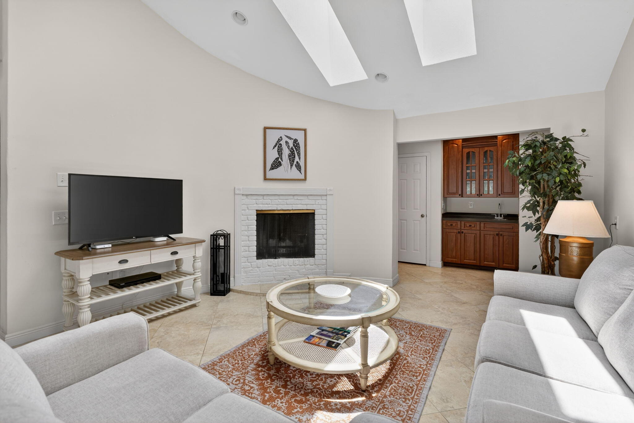5741 Southeast Winged Foot Drive Stuart, FL 34997 - Photo 15 of 58 a living room with furniture and a flat screen tv