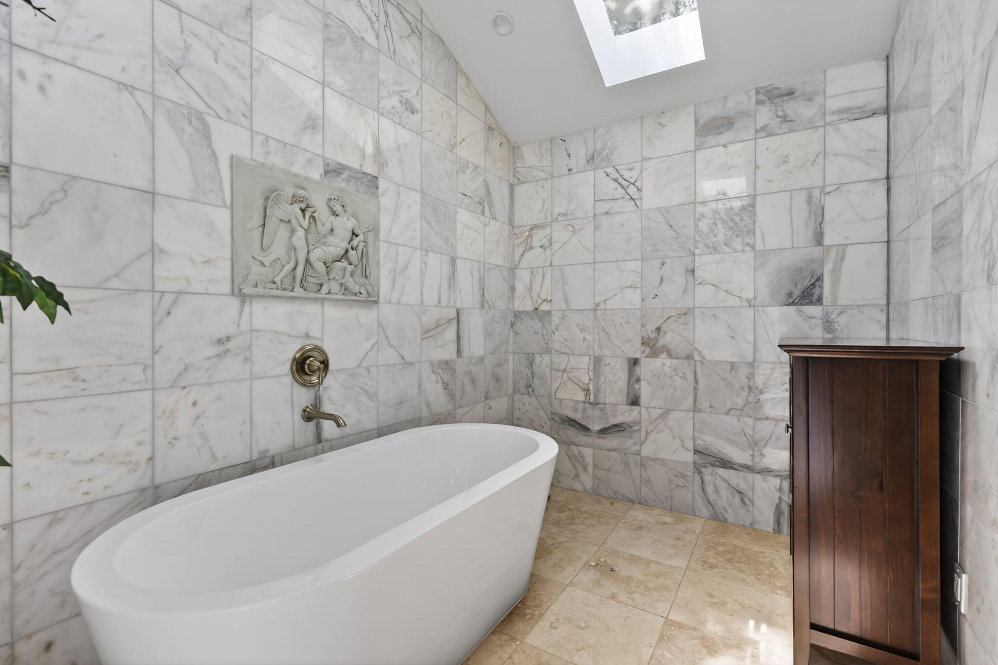 5741 Southeast Winged Foot Drive Stuart, FL 34997 - Photo 22 of 58 a bathroom with a bathtub
