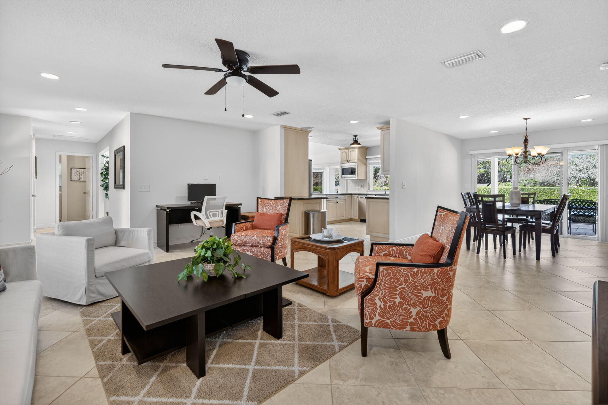 5741 Southeast Winged Foot Drive Stuart, FL 34997 - Photo 5 of 58 a view of a dining room with furniture