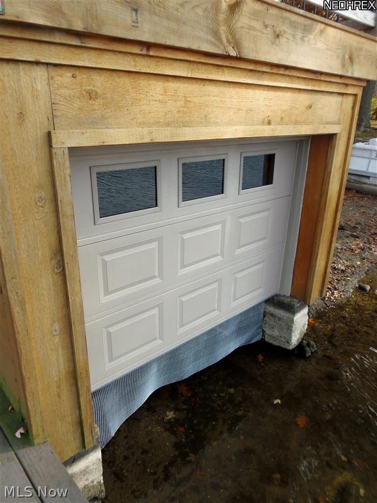 3848 South Turkeyfoot Road Akron, OH 44319 - Photo 5 of 25 boat house - lake is down 3 ft. at this time of year