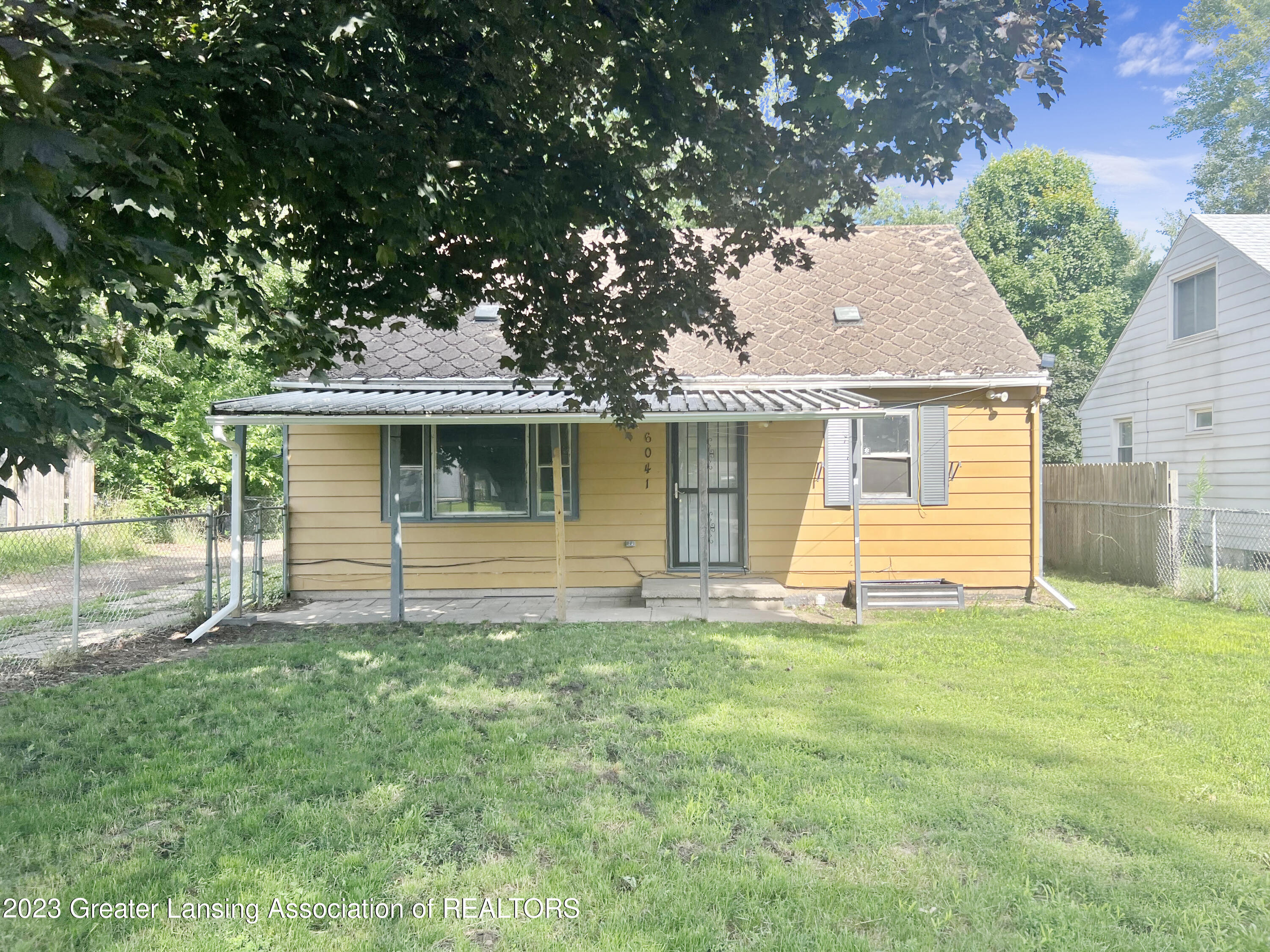 6041 Hughes Road Lansing, MI 48911 - Photo 2 of 15 Front