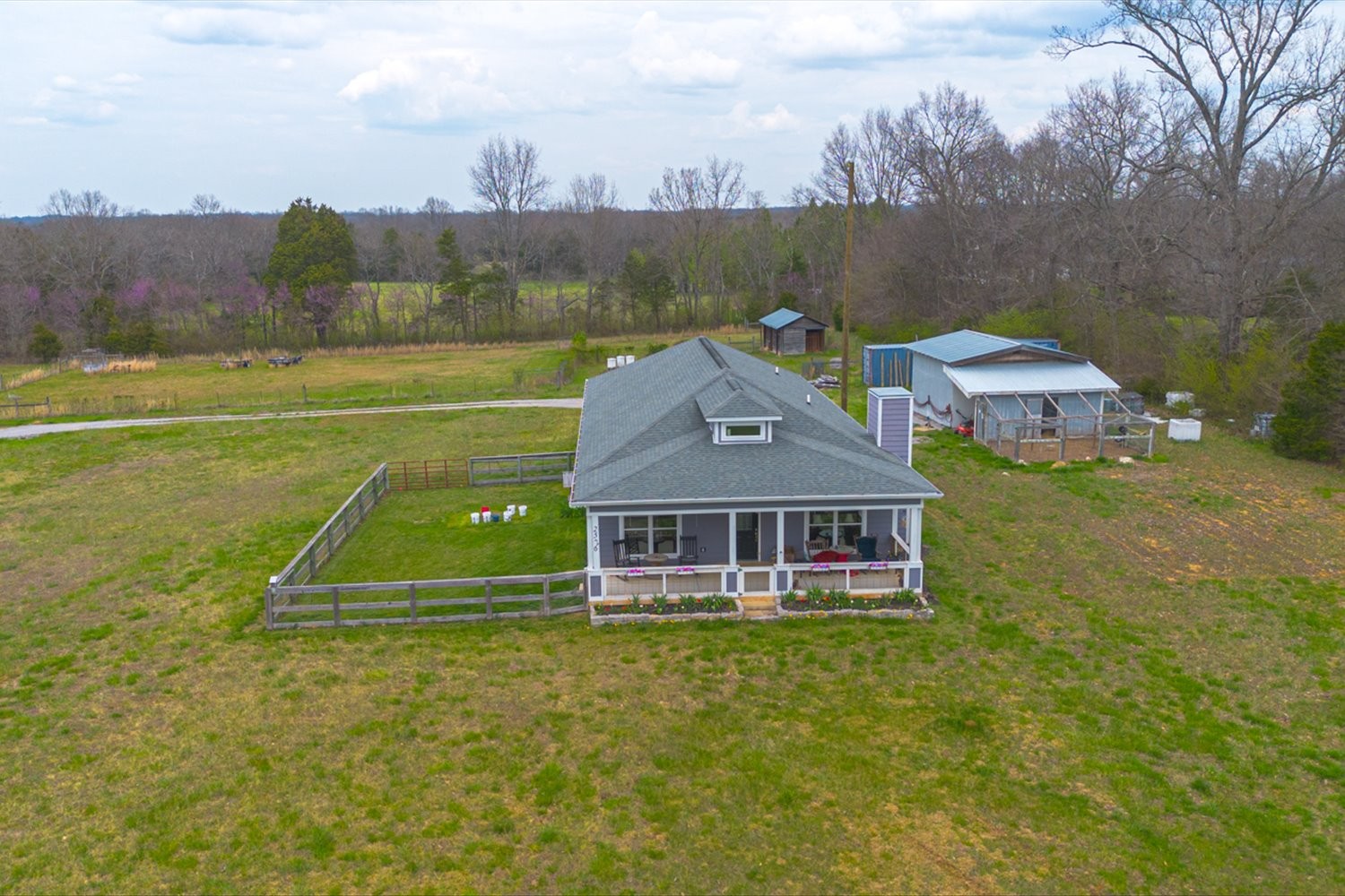 2526 Endsley Rankin Road Lewisburg, TN 37091 - Photo 33 of 49 an aerial view of a house with a garden and lake view