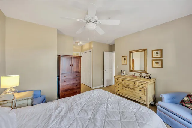 a bedroom with a bed and furniture