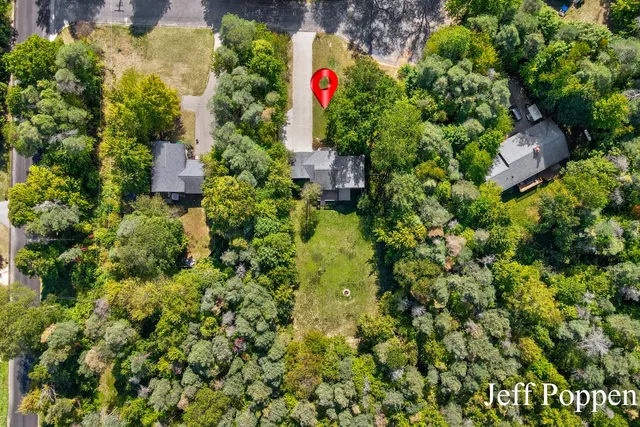 $350,000 | 13475 Lime Lake Drive Northeast, Sparta, MI 49345