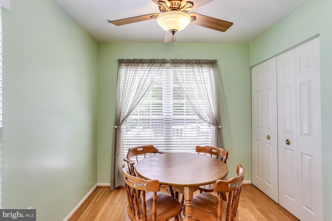 7407 Maury Road Baltimore, MD 21244 - Photo 18 of 39 Kitchen eat-in area with pantry closets in view