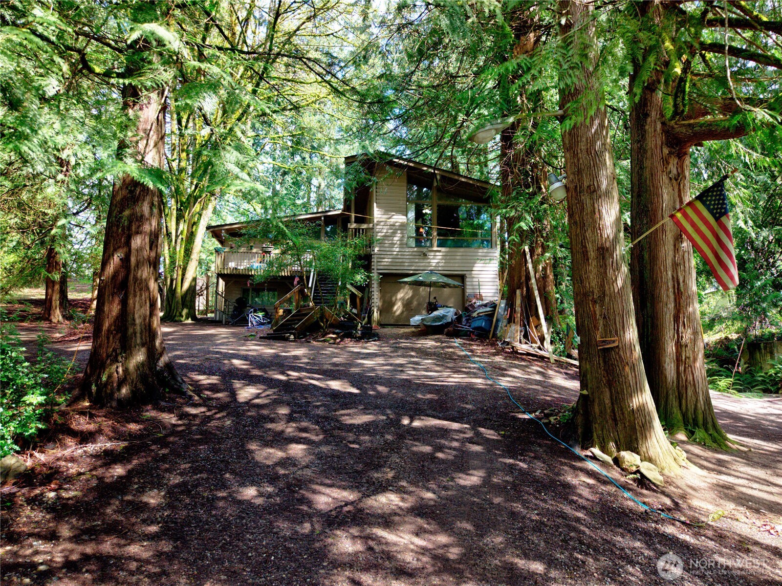 26910 Northeast Kennedy Drive Duvall, WA 98019 - Photo 2 of 24 a view of a house with backyard and a tree