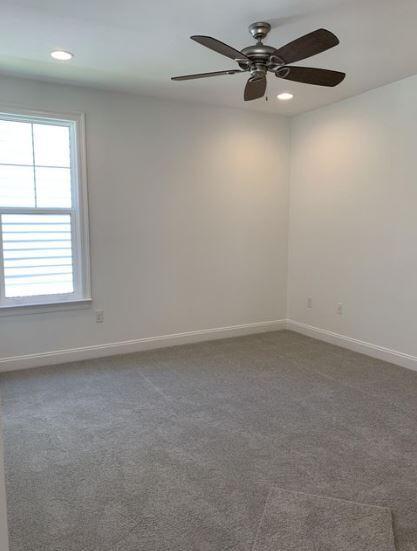 1144 Deer Moss Loop Niceville, FL 32578 - Photo 9 of 11 an empty room with a window and a fan