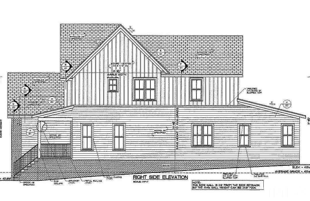 5062 Langley Circle Raleigh, NC 27609 - Photo 4 of 6 a black and white photo of a black white building