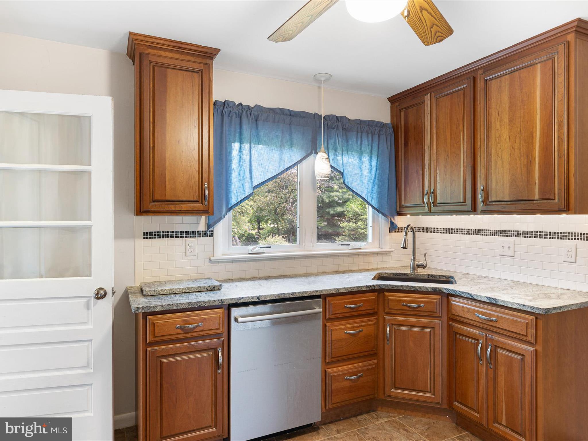 111 Cheltenham Road Newark, DE 19711 - Photo 7 of 31 Remodeled Kitchen with Backyard View