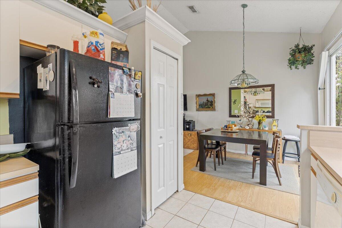 8006 Eden Road Fort Pierce, FL 34951 - Photo 11 of 25 a view of a dining room with workspace