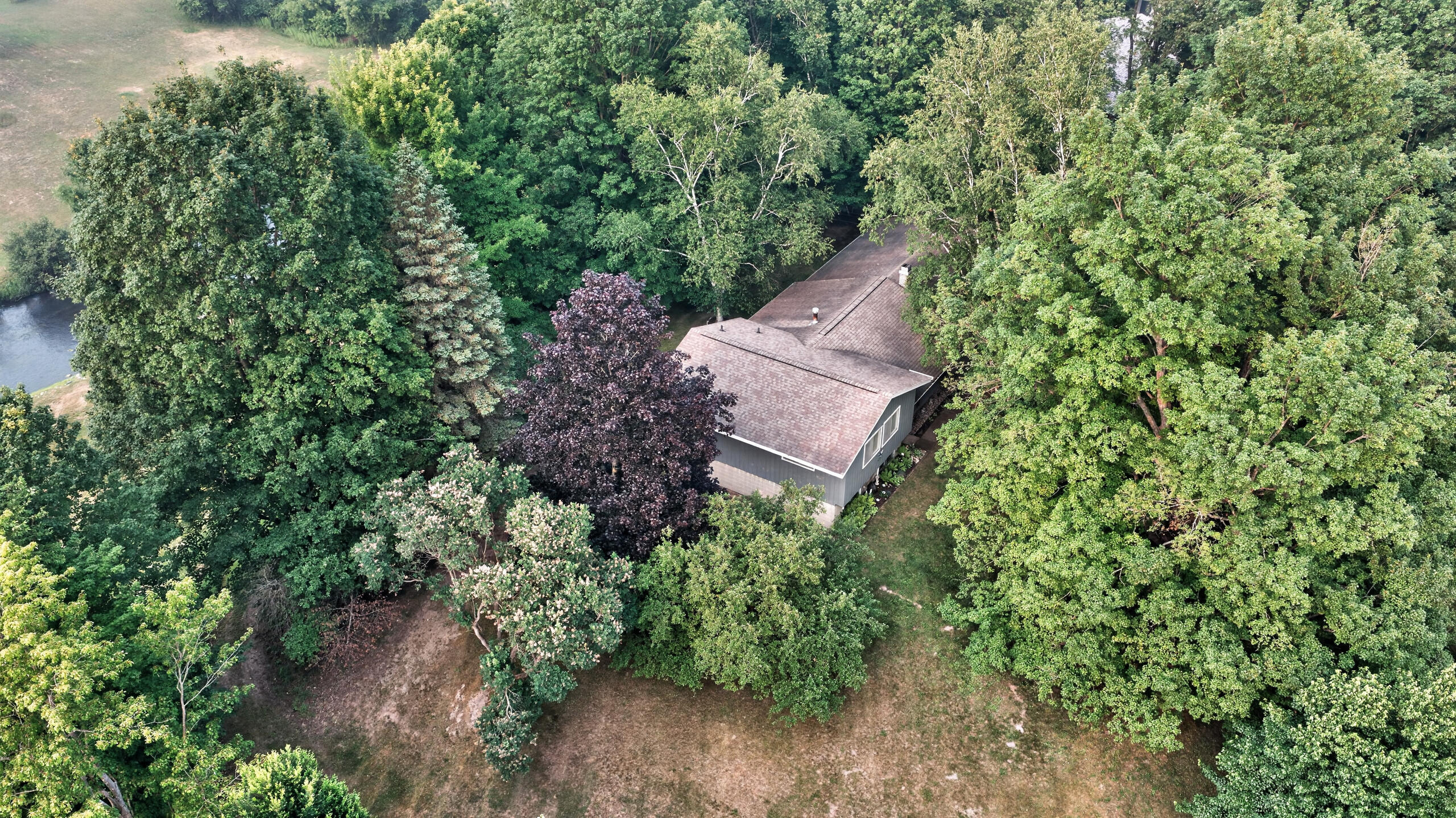 20210 Maple Drive Reed City, MI 49677 - Photo 12 of 53 DJI_20260717190845_0741_D