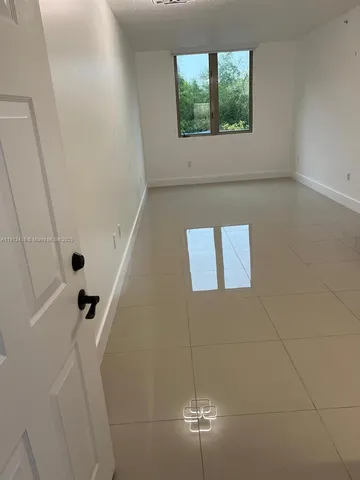 a view of a livingroom with a window