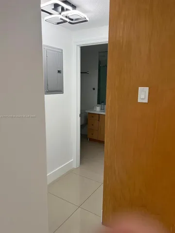 a view of a hallway with a closet