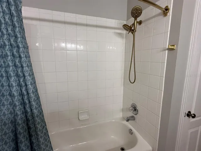 a bathroom with a bathtub