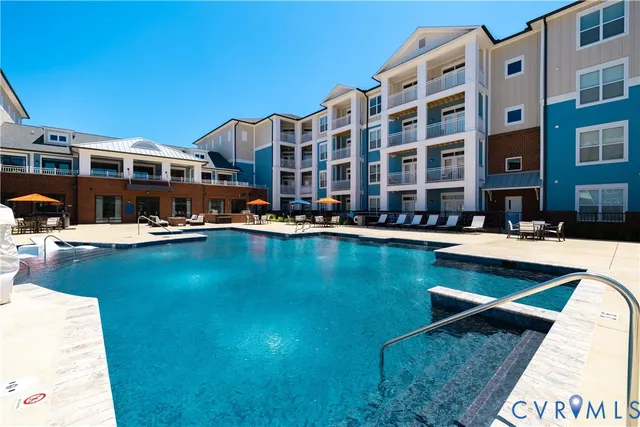 a view of a building with swimming pool