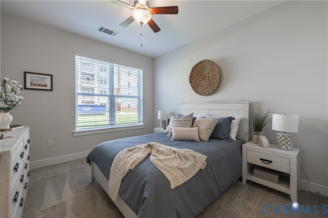 10525 Stony Blf Drive, Unit 204 Ashland, VA 23005 - Photo 23 of 36 a bedroom with a bed and a window
