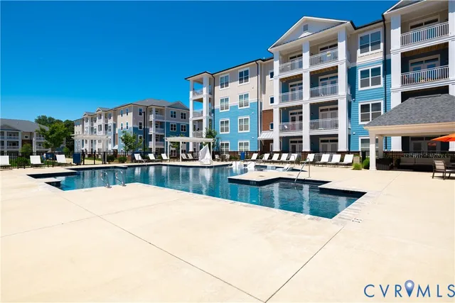 a view of a swimming pool and a buildings