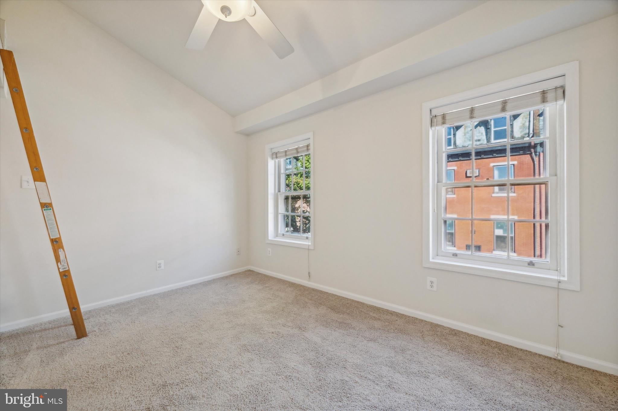 2032 Pine Street, Unit 2 Philadelphia, PA 19103 - Photo 8 of 13 an empty room with a window