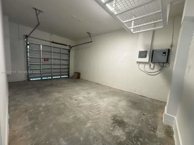 front view of multiple houses with a yard