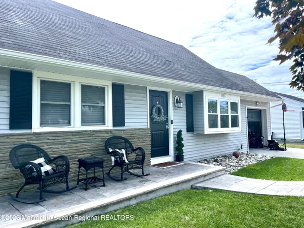 a front view of a house with patio