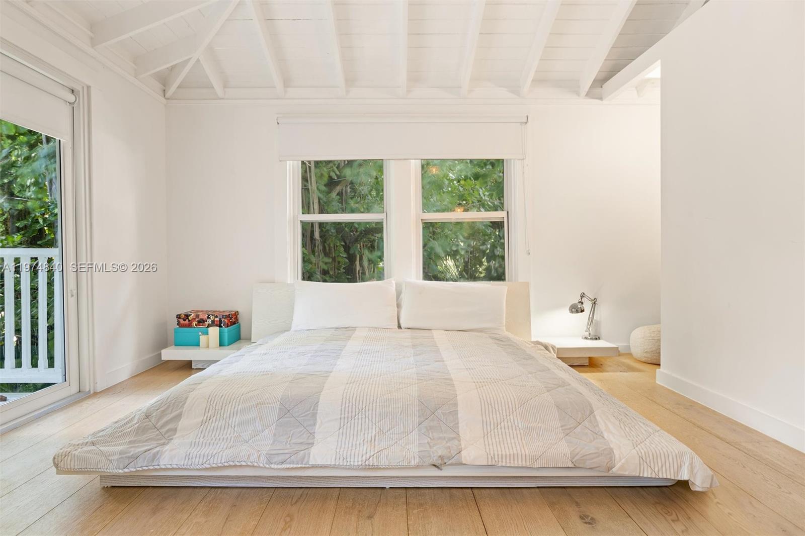 4286 Douglas Road Miami, FL 33133 - Photo 34 of 51 a bathroom with a granite countertop sink and a large window