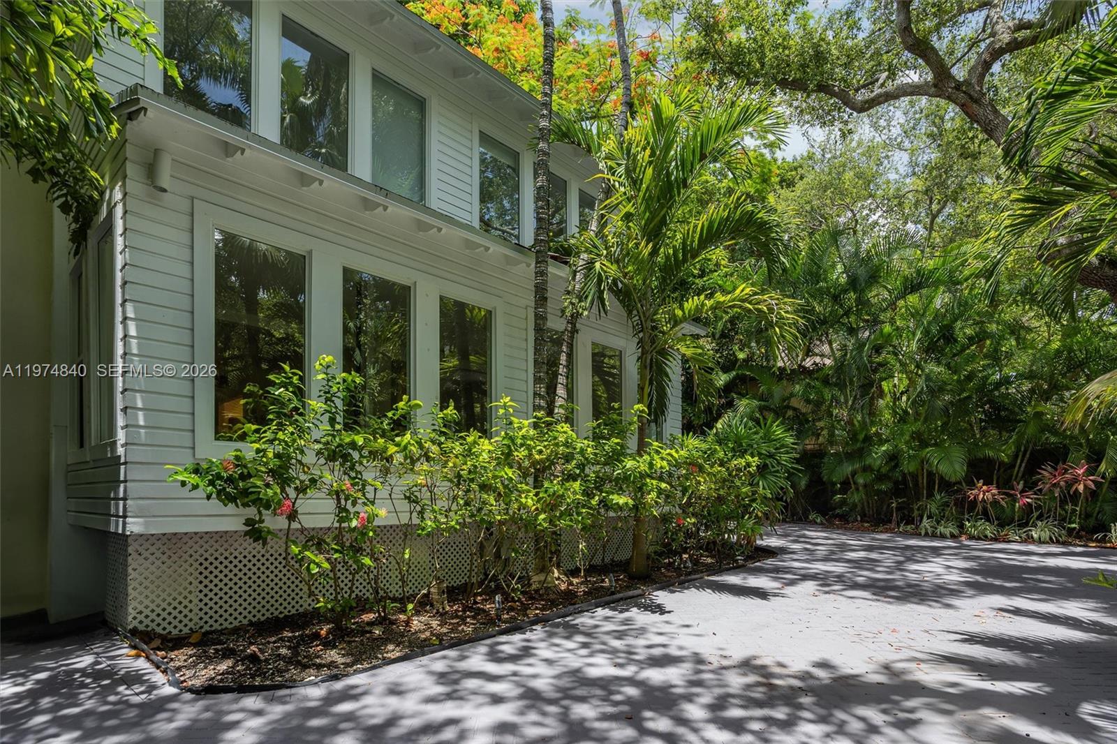 4286 Douglas Road Miami, FL 33133 - Photo 40 of 51 a view of a garden with plants