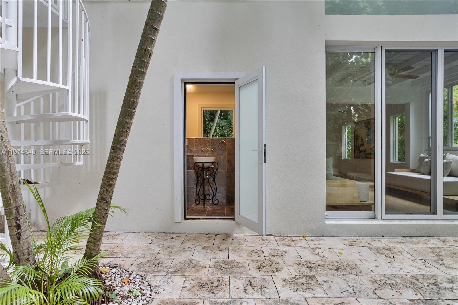4286 Douglas Road Miami, FL 33133 - Photo 44 of 51 a view of a front door of the house