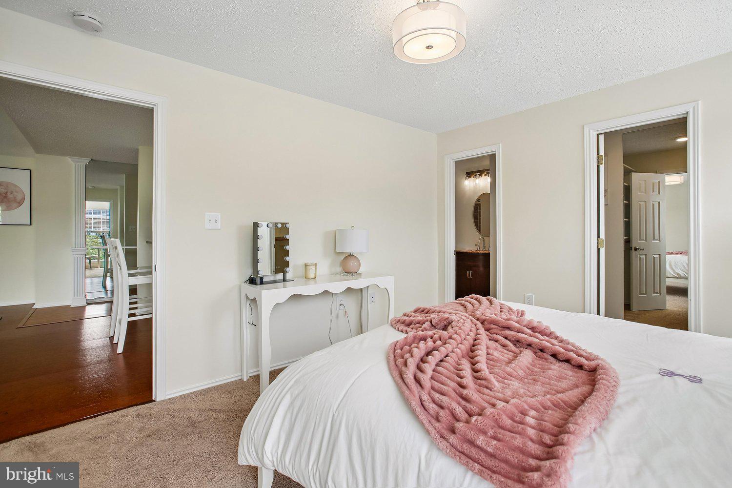 20963 Timber Ridge Terrace, Unit 304 Ashburn, VA 20147 - Photo 15 of 42 Primary Bedroom