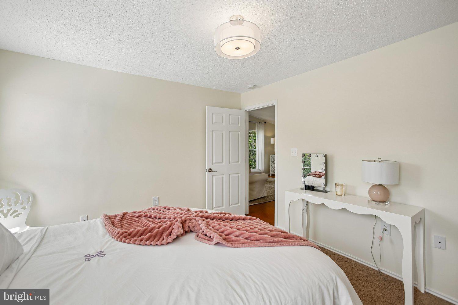 20963 Timber Ridge Terrace, Unit 304 Ashburn, VA 20147 - Photo 16 of 42 Primary Bedroom