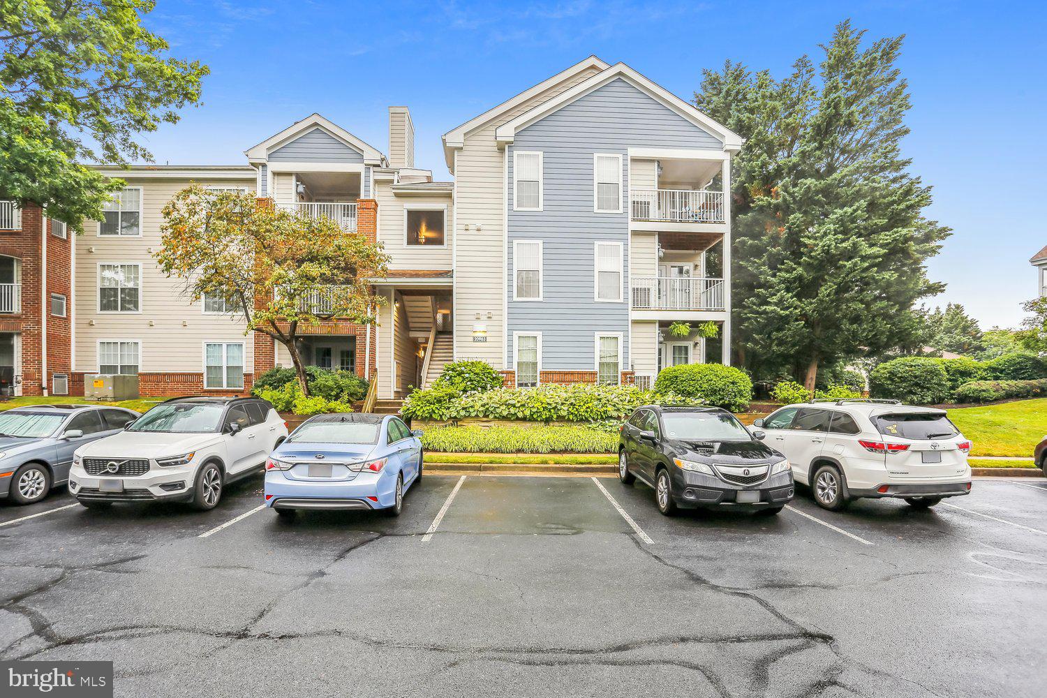20963 Timber Ridge Terrace, Unit 304 Ashburn, VA 20147 - Photo 30 of 42 20963 Timber Ridge Ter Back Elevation
