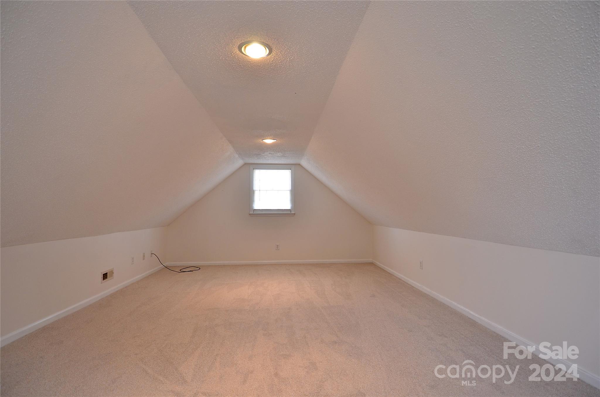322 Cobblestone Drive Marion, NC 28752 - Photo 15 of 26 a view of an empty room with a window