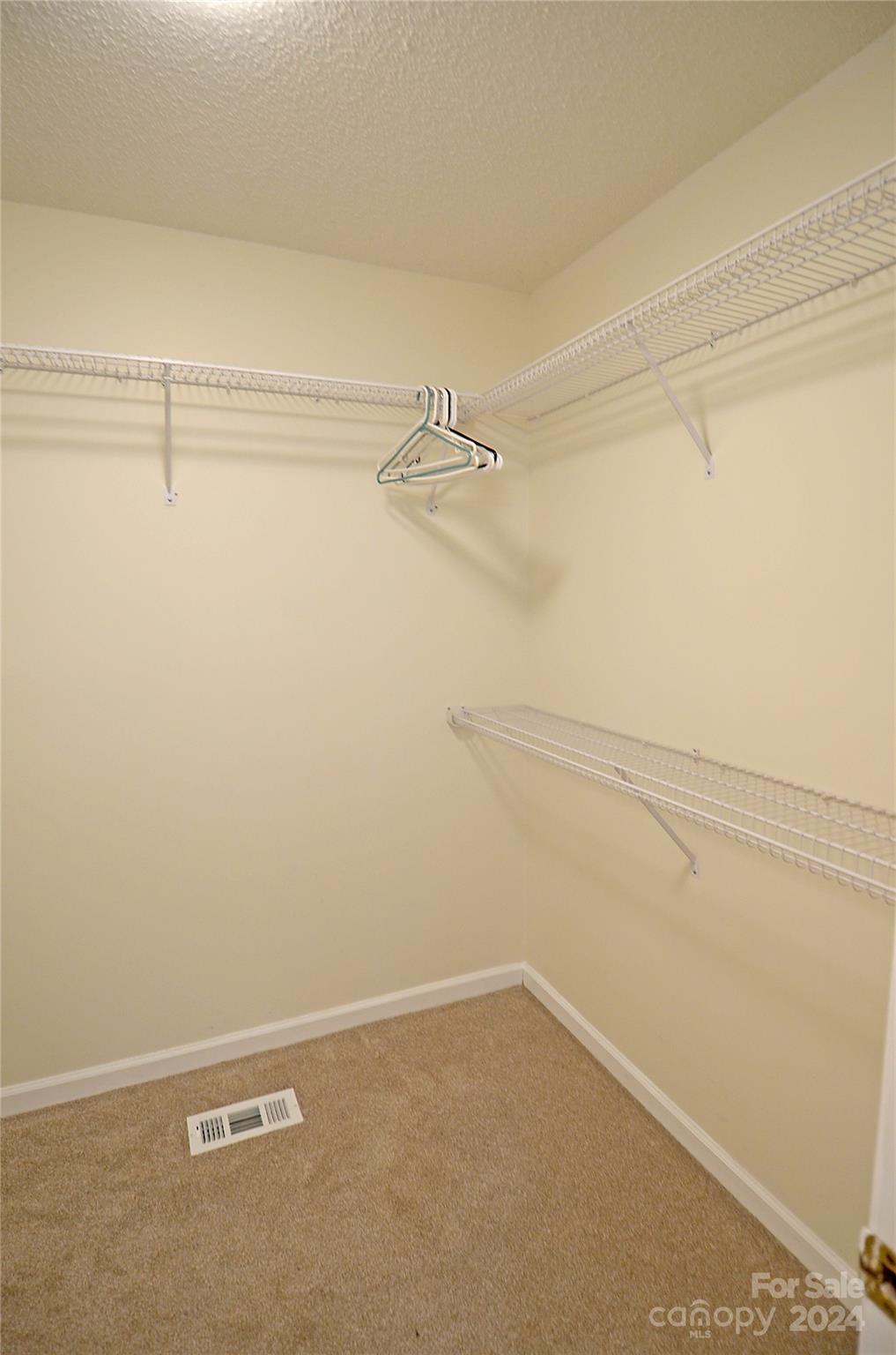 322 Cobblestone Drive Marion, NC 28752 - Photo 19 of 26 a view of a room with racks on the wall