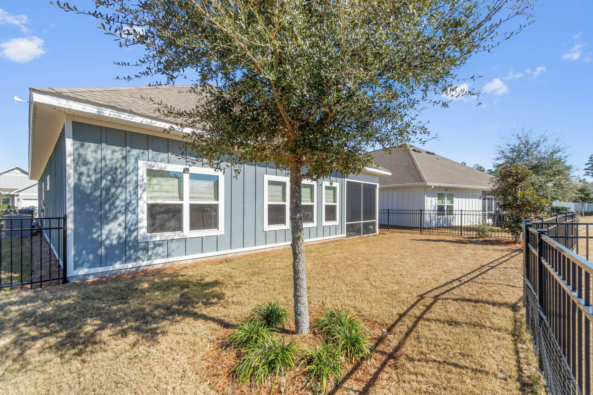 31 Dusky Way Freeport, FL 32439 - Photo 32 of 46 Backyard with Wrought Iron Fencing