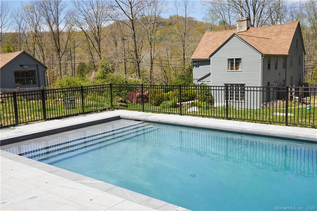 a view of backyard with green space