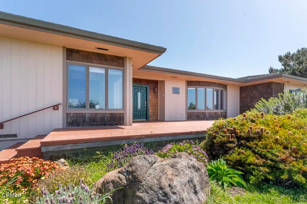 a front view of a house with porch