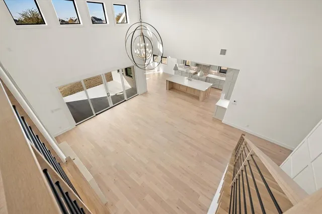 a bathroom with a double vanity sink toilet and shower