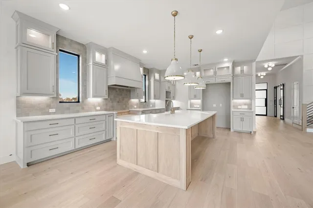 a large kitchen with a lot of counter space