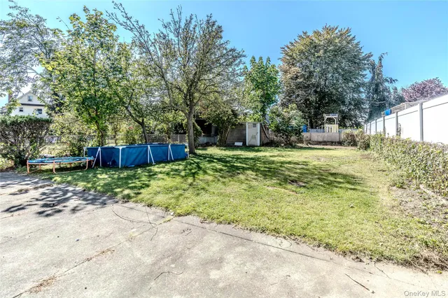 a fire hydrant in the middle of a field