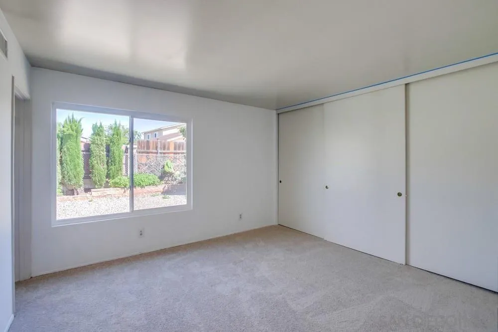 12941 Standish Drive Poway, CA 92064 - Photo 17 of 30 an empty room with windows