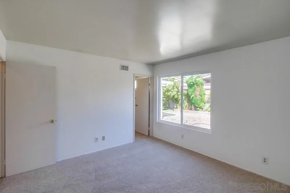 12941 Standish Drive Poway, CA 92064 - Photo 18 of 30 a view of an empty room with a window