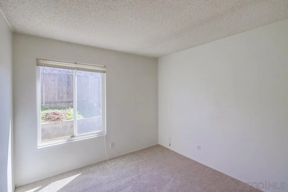 12941 Standish Drive Poway, CA 92064 - Photo 23 of 30 an empty room with windows