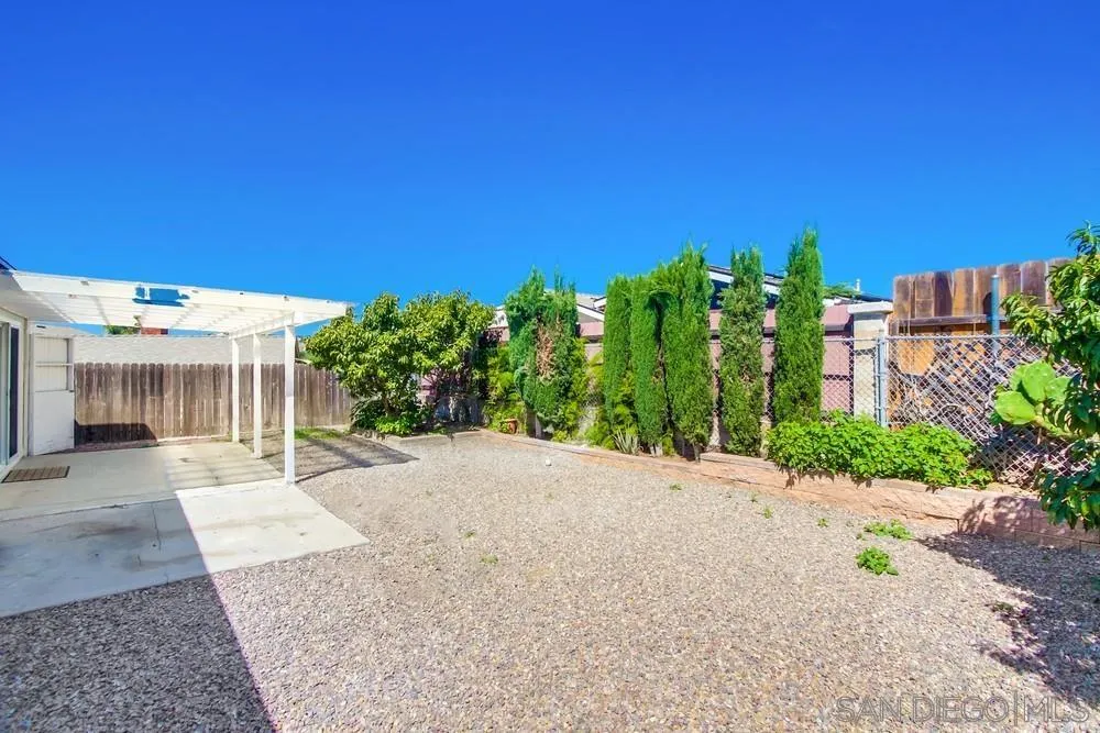 12941 Standish Drive Poway, CA 92064 - Photo 30 of 30 a view of a house with a yard and potted plants