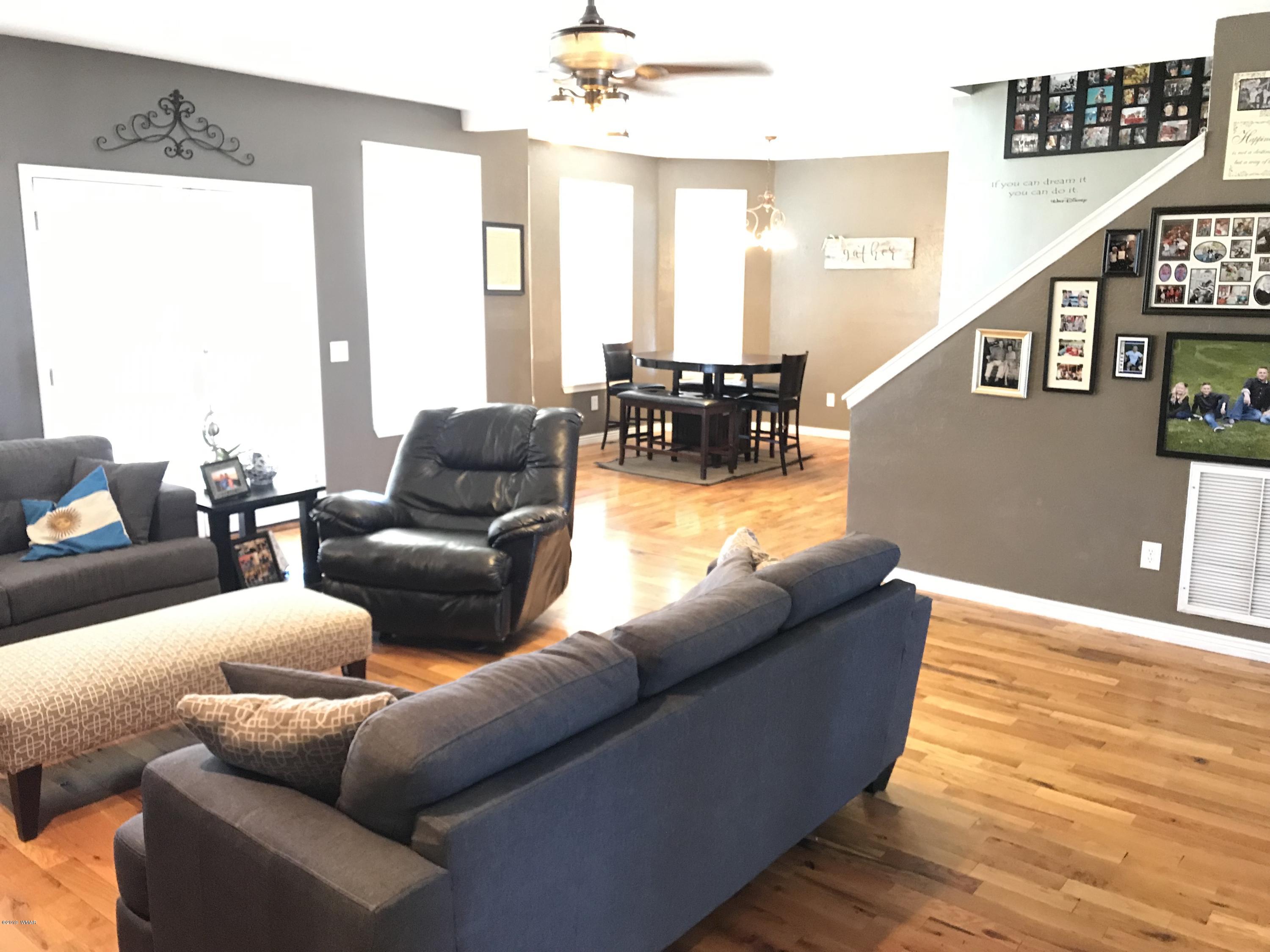 1362 Lobo Trail Snowflake, AZ 85937 - Photo 13 of 34 a living room with furniture and a wooden floor