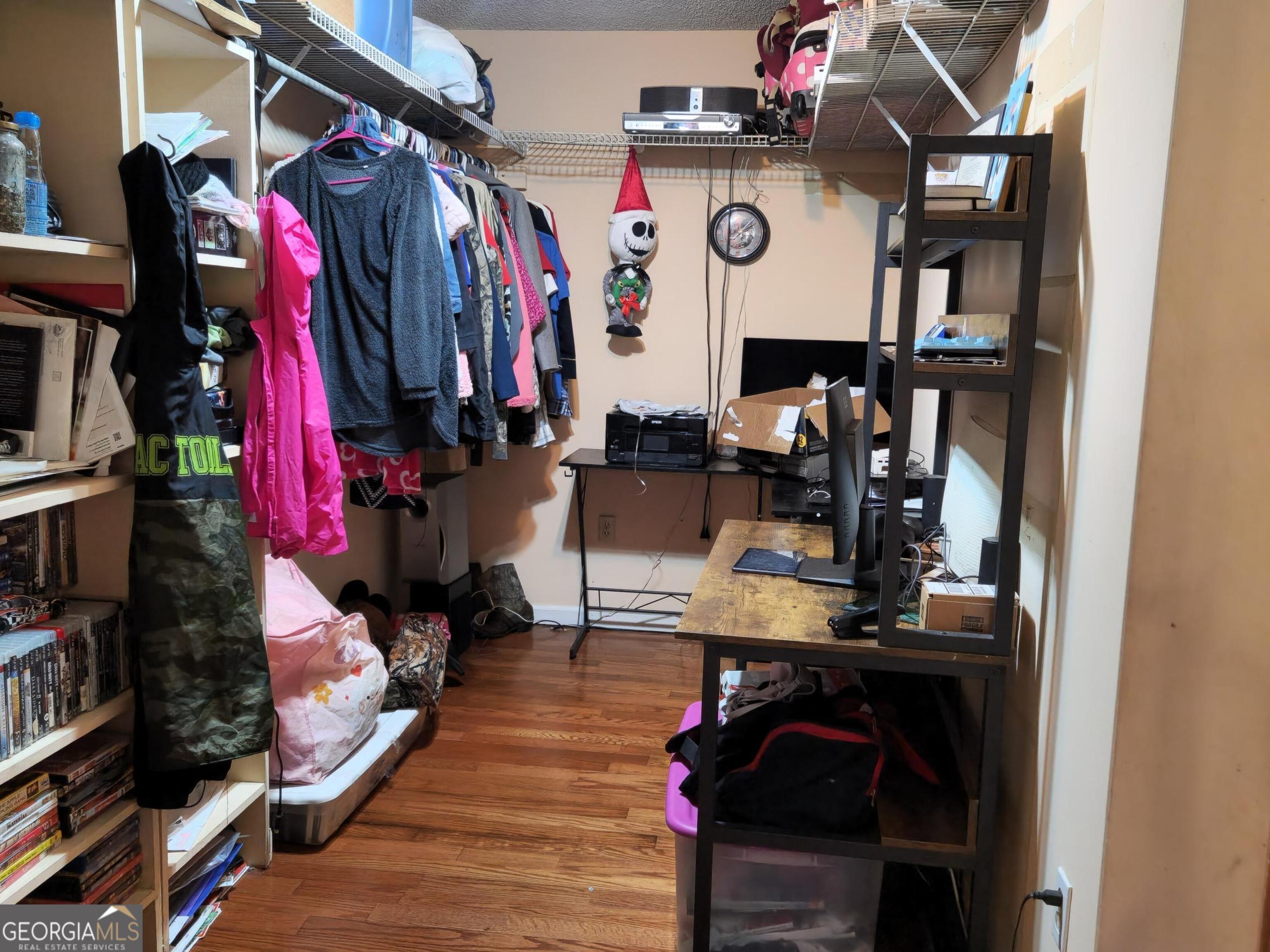 985 Frank Road Ocilla, GA 31774 - Photo 13 of 13 a view of walk in closet with clothes and shoes