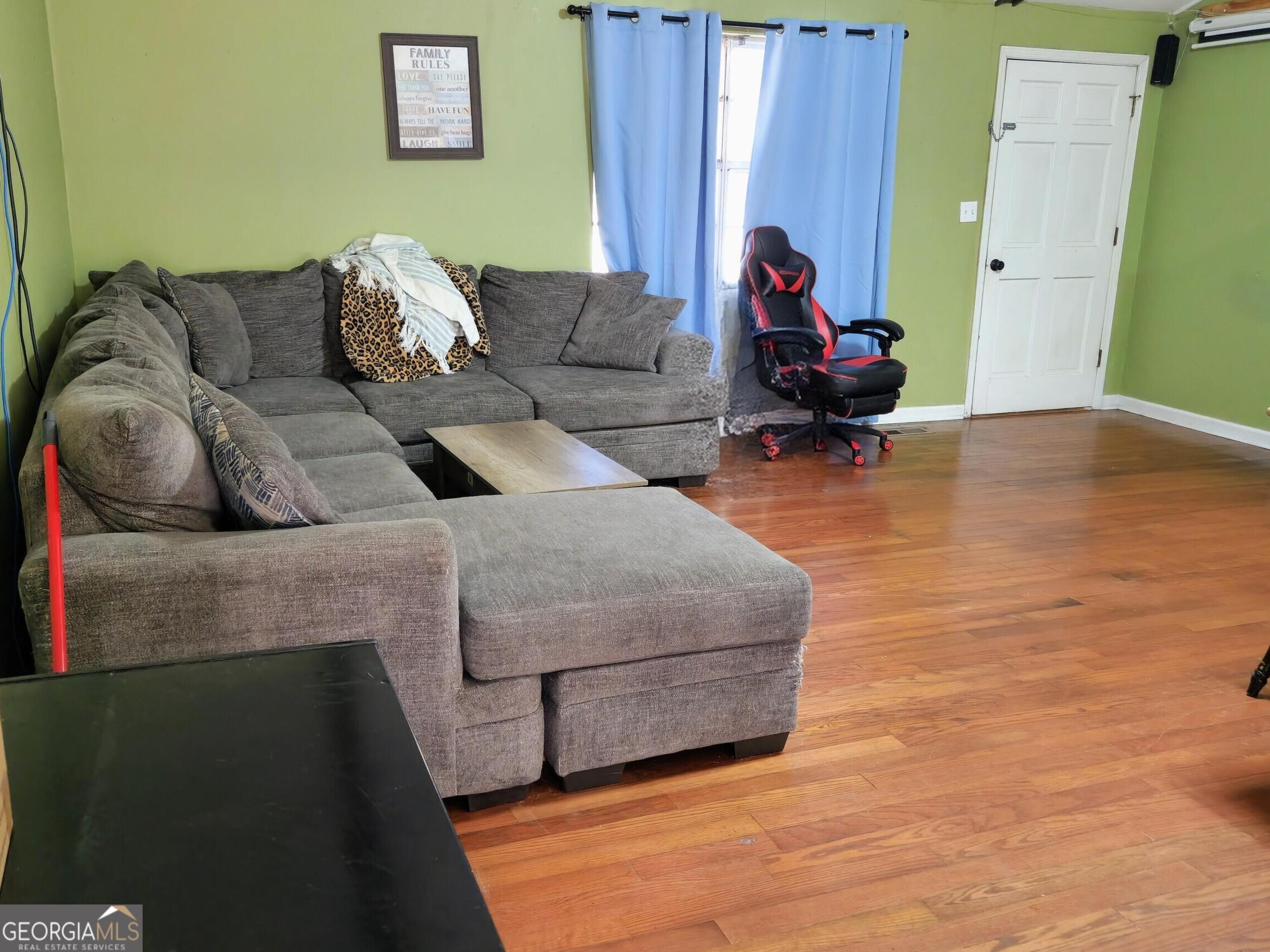 985 Frank Road Ocilla, GA 31774 - Photo 5 of 13 a living room with furniture and a window