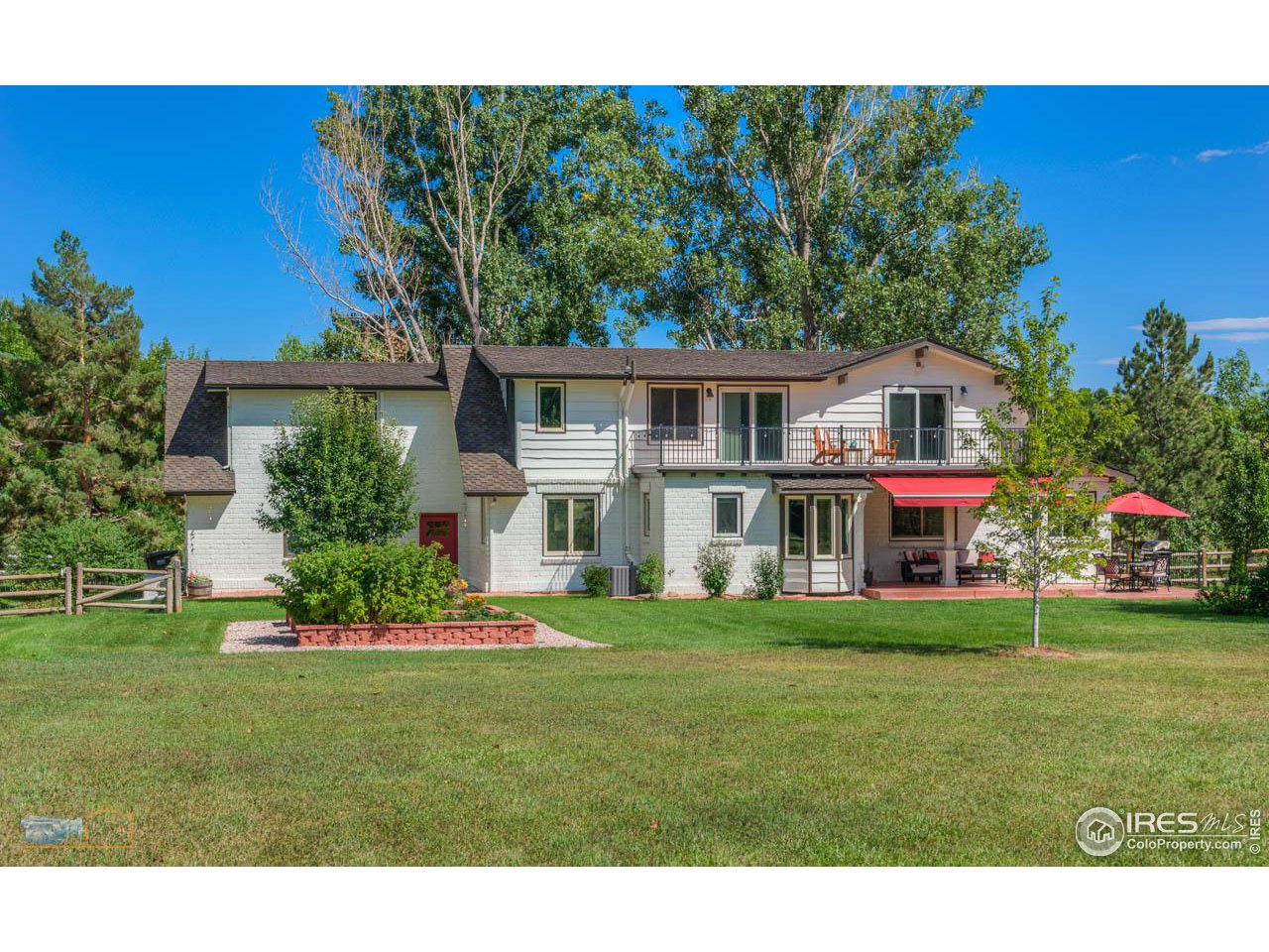 4881 Valkyrie Drive Boulder, CO 80301 - Photo 13 of 39 a front view of house with yard and green space