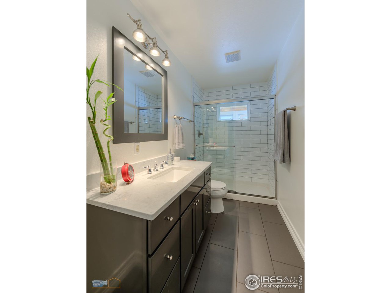4881 Valkyrie Drive Boulder, CO 80301 - Photo 17 of 39 a bathroom with a sink and a mirror