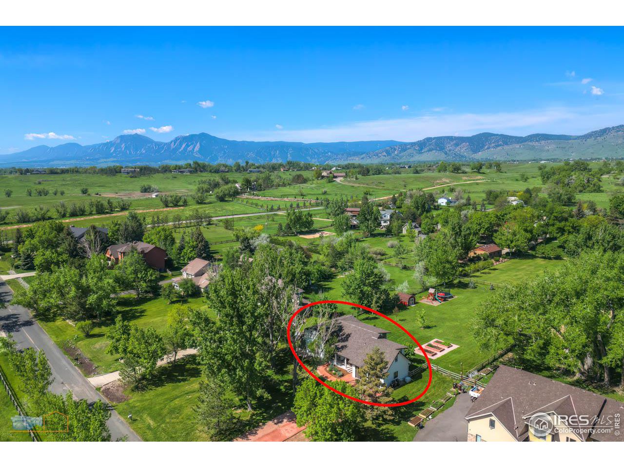 4881 Valkyrie Drive Boulder, CO 80301 - Photo 2 of 39 a view of a city with lush green forest