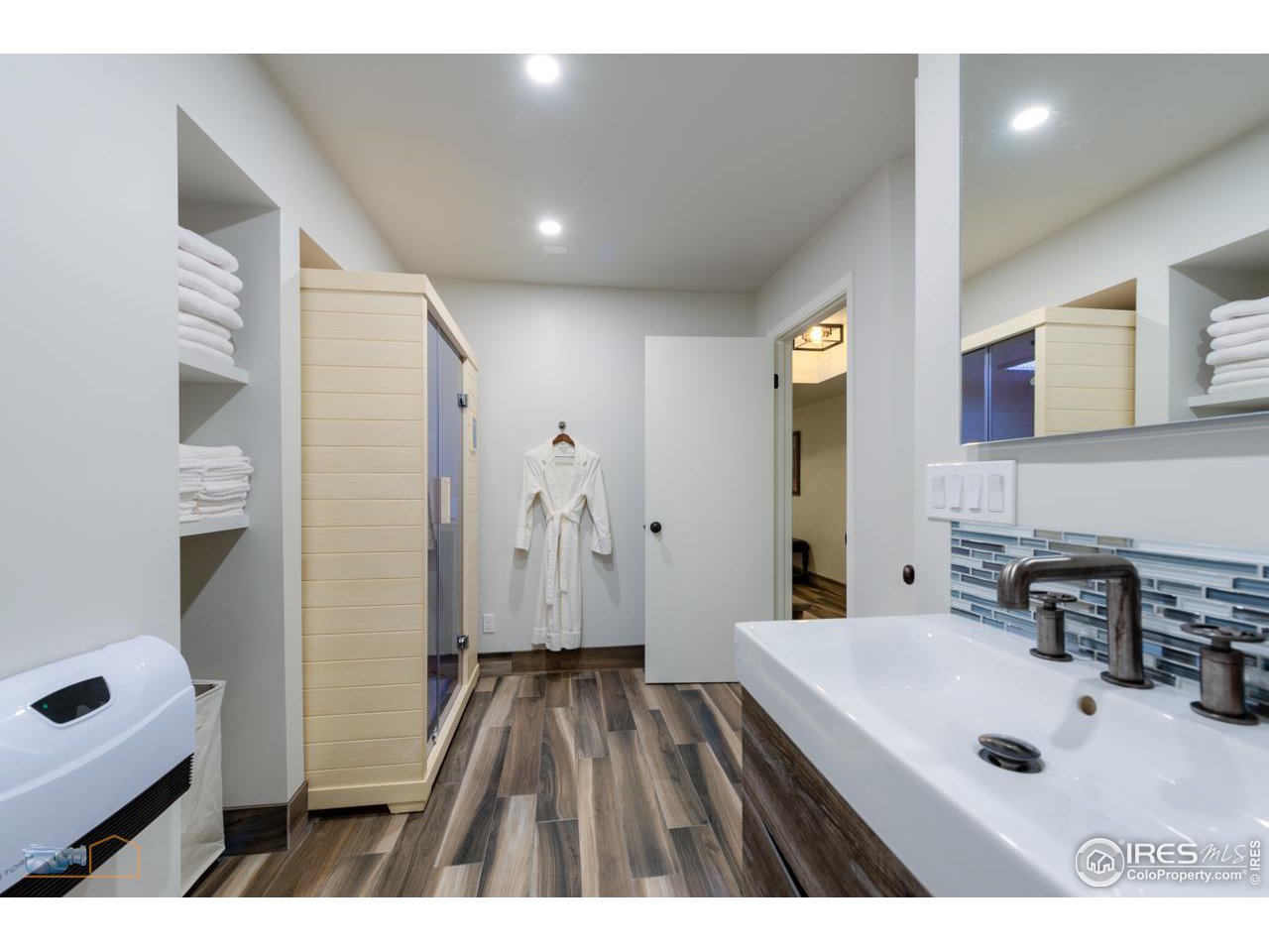 4881 Valkyrie Drive Boulder, CO 80301 - Photo 34 of 39 a bathroom with a sink a toilet and shower