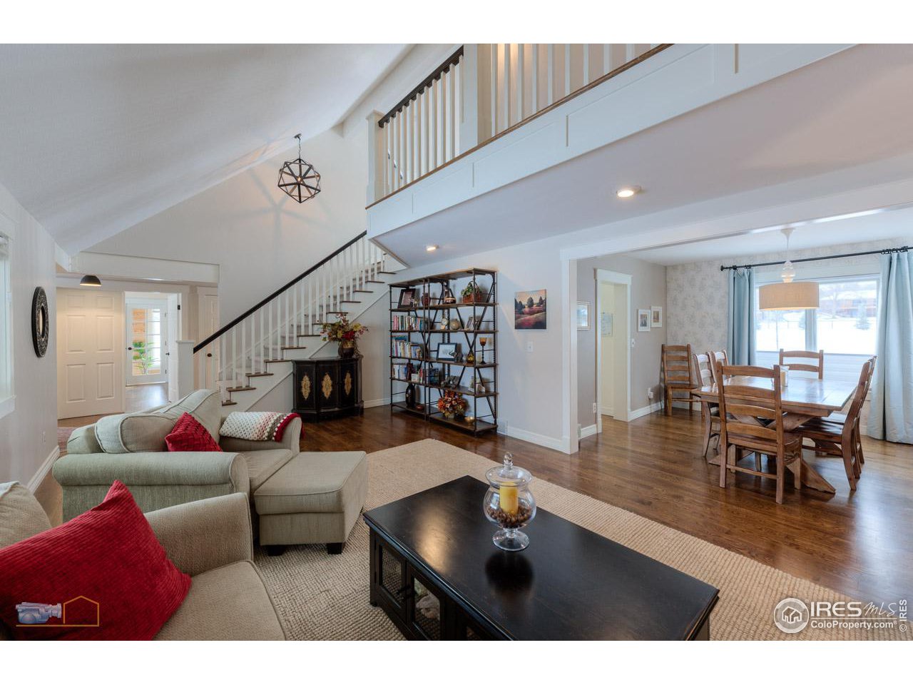 4881 Valkyrie Drive Boulder, CO 80301 - Photo 4 of 39 a living room with furniture and a wooden floor